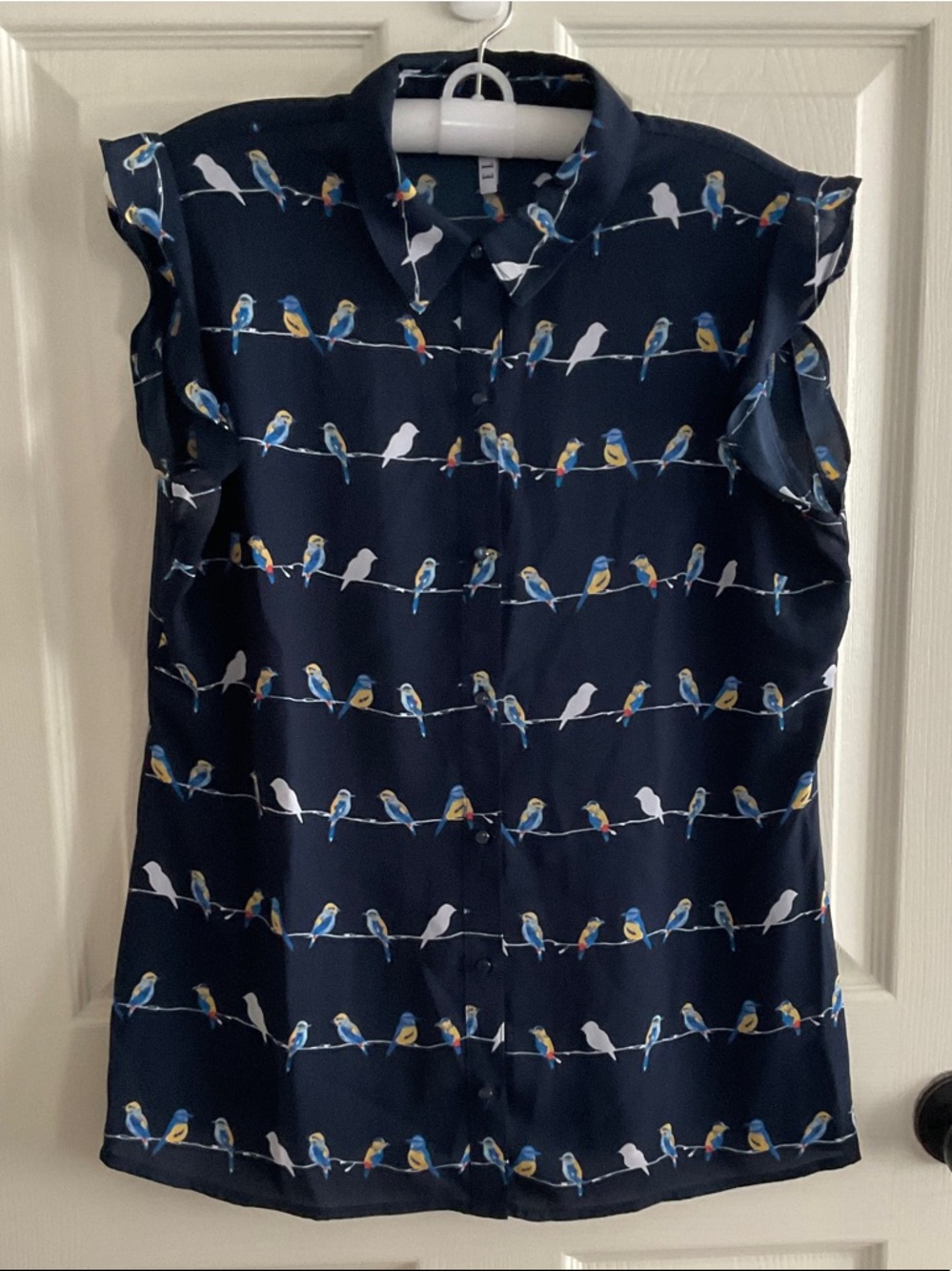 Elle Navy Sleeveless Button-Front Blouse with Bird Print